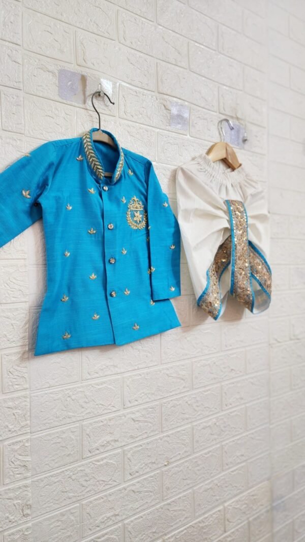 sky blue rawsilk maggam kurtha with dhothi